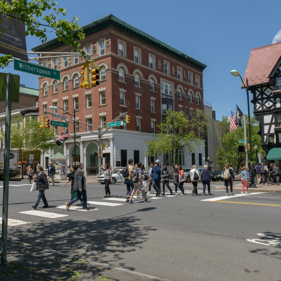 people walking across street in princeton